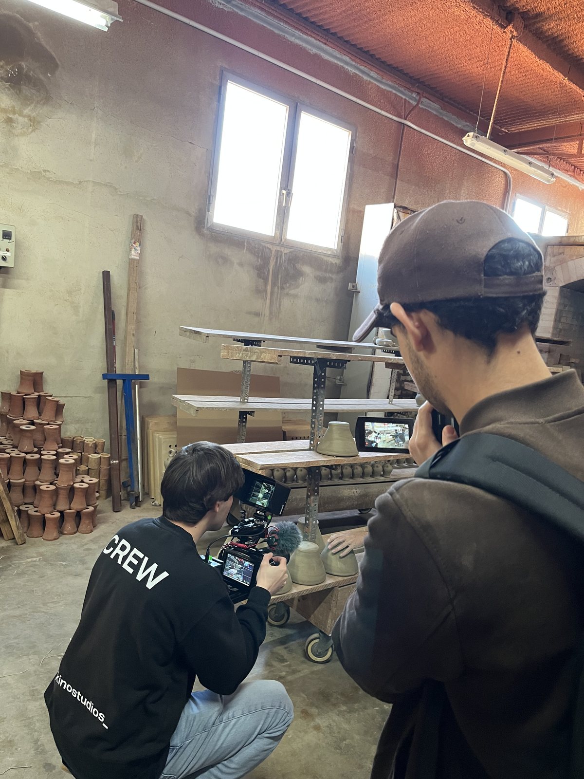 Crew filming a scene indoors