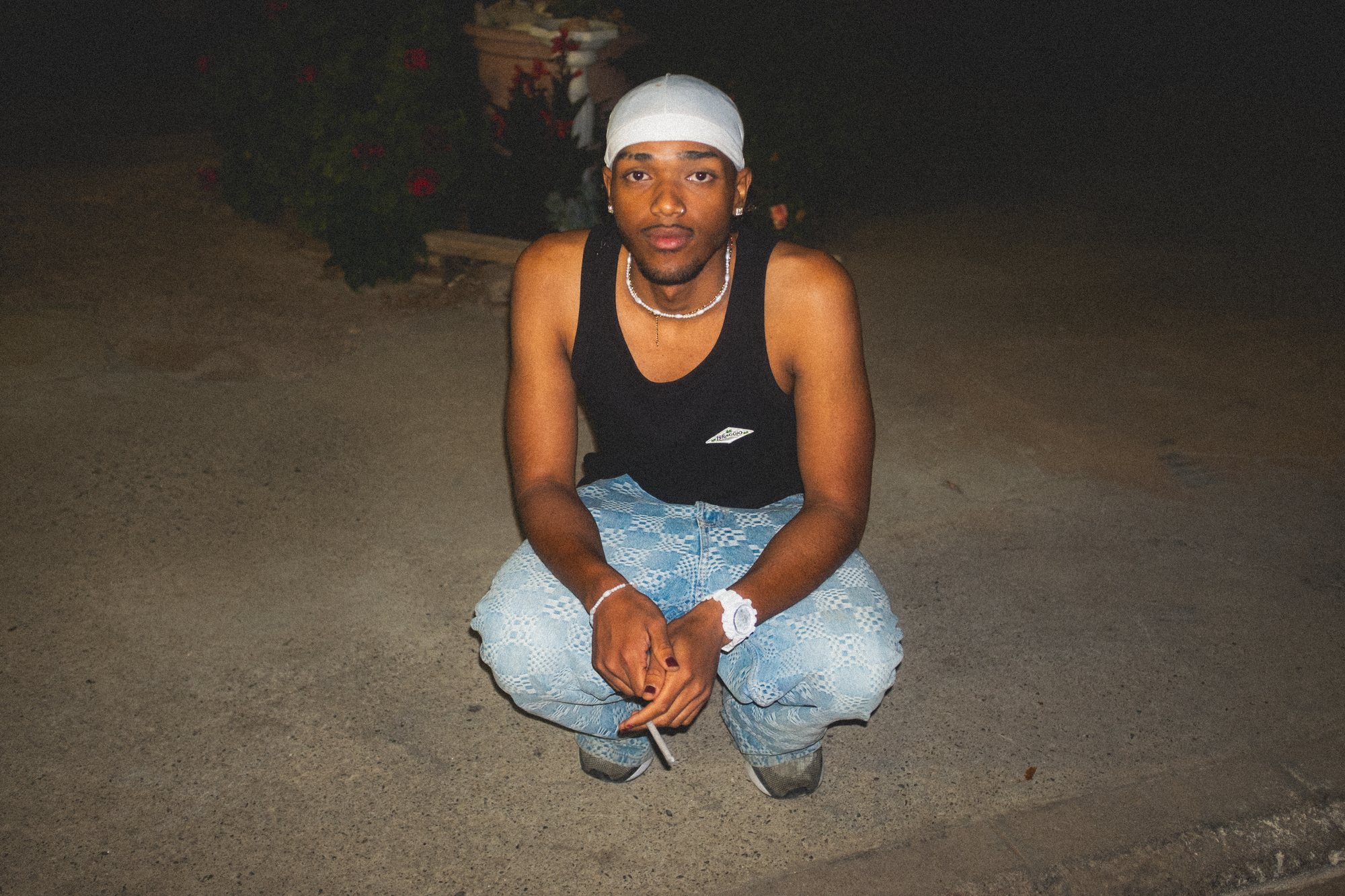 Portrait of the performer seated on location